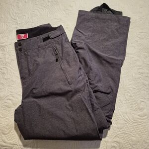 Rossignol women's Medium gray ski pants, bottoms have small cuts from use